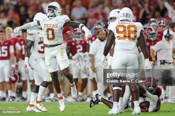 Anthony Hill Jr. #0 of the Texas Longhorns reacts after tackling Jalen Milroe of the Alabama Crimson Tide during the third quarter at Bryant-Denny...