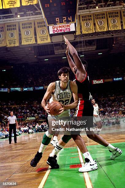 Kevin McHale of the Boston Celtics drives to the basket during the 1992 NBA game against the Portland Trail Blazers at the Boston Garden in Boston,...