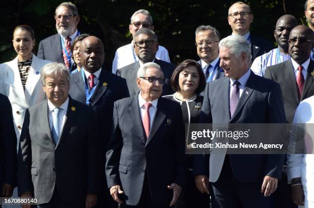 Secretary-General Antonio Guterres, Cuban revolutionary leader Raul Castro and Cuban President Miguel Diaz-Canel pose for a group photo at the Summit...