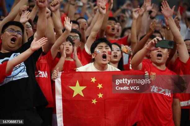 Supporters of Team China cheer up during the AFC U23 Asian Cup Qualifier Group G match between China and India at the Suoyuwan Stadium on September...