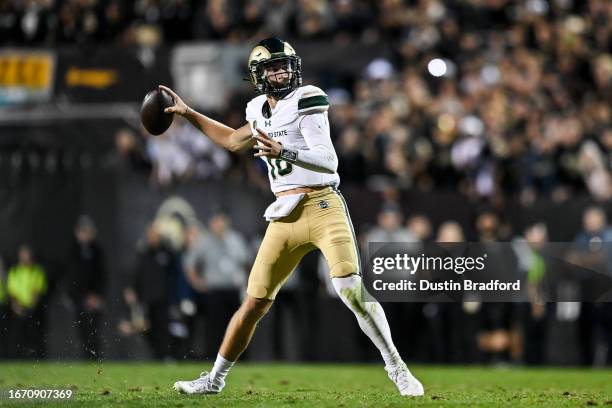 Quarterback Brayden Fowler-Nicolosi of the Colorado State Rams attempts a pass in the overtime period against the Colorado Buffaloes at Folsom Field...