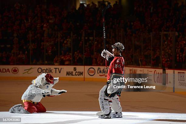 Miikka Kiprusoff of the Calgary Flames acknowledges the crowd after being named first star of the game against the Anaheim Ducks on April 19, 2013 at...