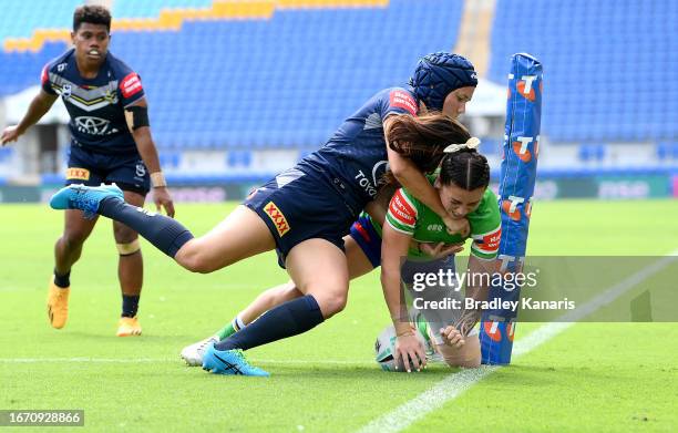 Madison Bartlett of the Raiders scores a try during the round eight NRLW match between North Queensland Cowboys and Canberra Raiders at Cbus Super...