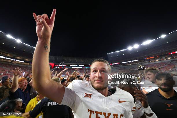 Quinn Ewers of the Texas Longhorns reacts after defeating Alabama Crimson Tide 34-24 at Bryant-Denny Stadium on September 09, 2023 in Tuscaloosa,...