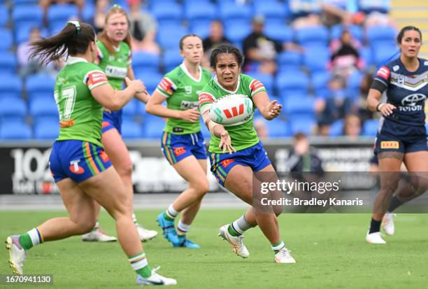 Simaima Taufa of the Raiders passes the ball during the round eight NRLW match between North Queensland Cowboys and Canberra Raiders at Cbus Super...