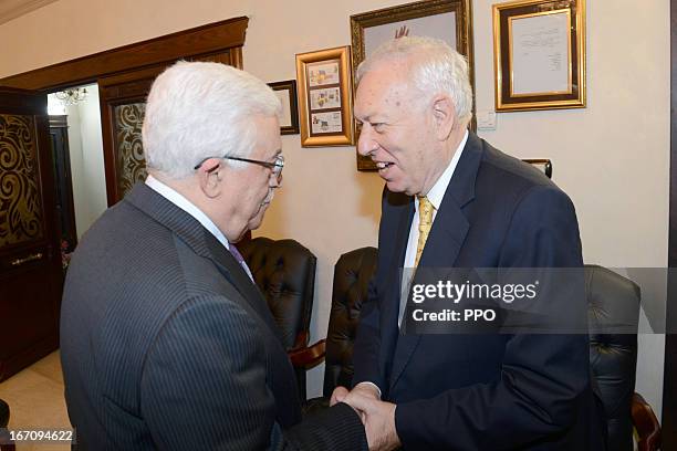 In this handout image provided by the Palestinian Press Office , Palestinian President Mahmoud Abbas meets with Spanish Foreign Minister Jose Manuel...