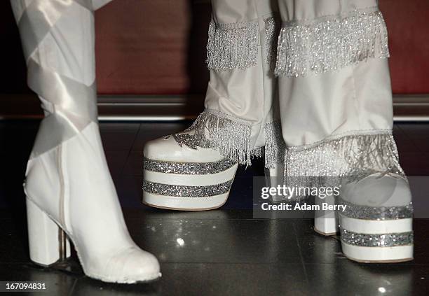 The shoes of wax figures of the members of the Swedish pop group ABBA, Agnetha Faltskog and Bjoern Ulvaeus, wearing copies of the outfits made for...