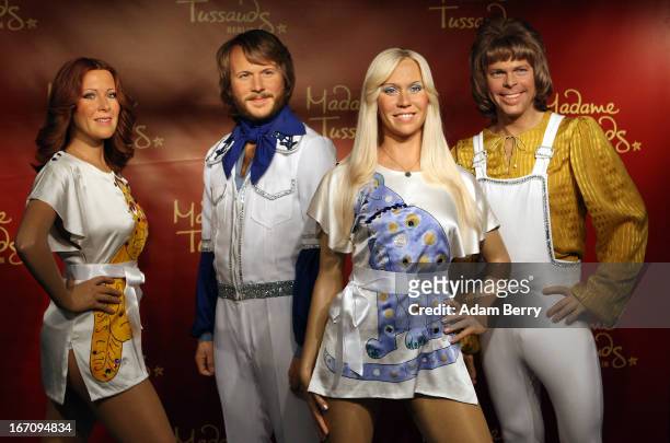 Wax figures of the members of the Swedish pop group ABBA, Anni-Frid Lyngstad, Benny Andersson, Agnetha Faltskog, and Bjoern Ulvaeus, wearing copies...