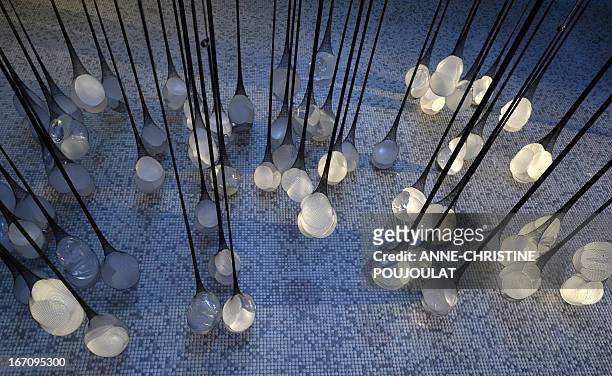 Photo taken on April 19, 2013 shows the art creation "PIP Show" by French artist Camille Lorin made with fishnet stockings containing breast implants...