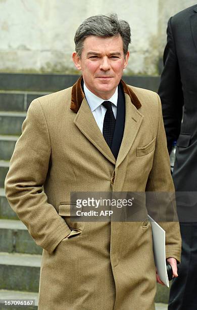 Sports Minister Hugh Robertson leaves after attending the ceremonial funeral of British former prime minister Margaret Thatcher at St Paul's...