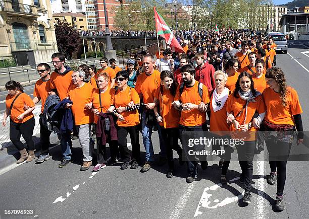 Demonstrators take part in a march against the arrest of eight members of the Basque pro-independence youth organization SEGI in the northern Spanish...