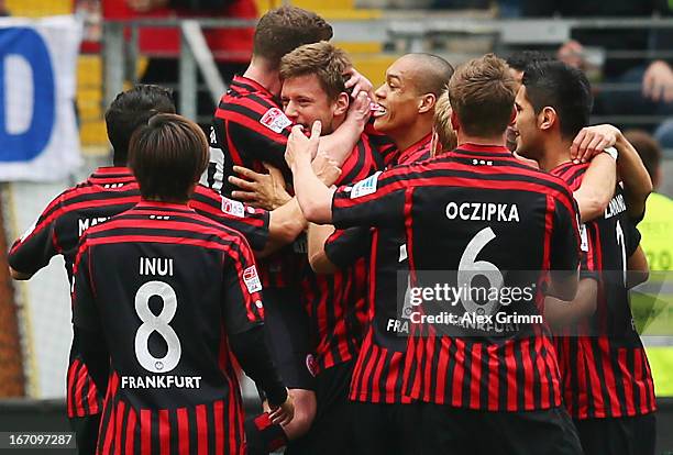 Marco Russ of Frankfurt celebrates his team's first goal with team mates during the Bundesliga match between Eintracht Frankfurt and FC Schalke 04 at...