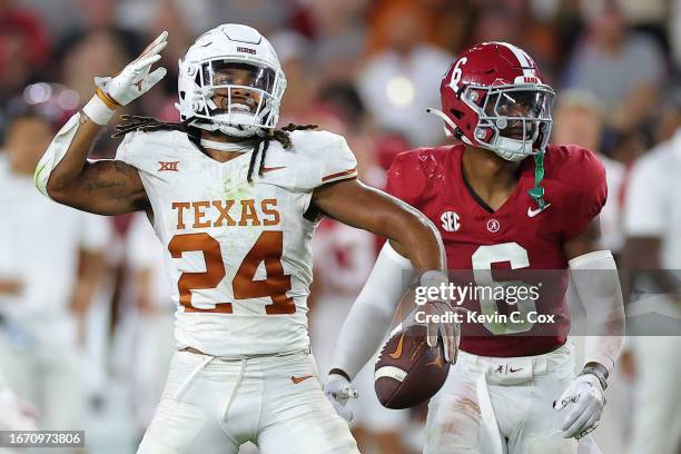 Jonathon Brooks of the Texas Longhorns reacts after rushing for a first down during the fourth quarter against the Alabama Crimson Tide at...