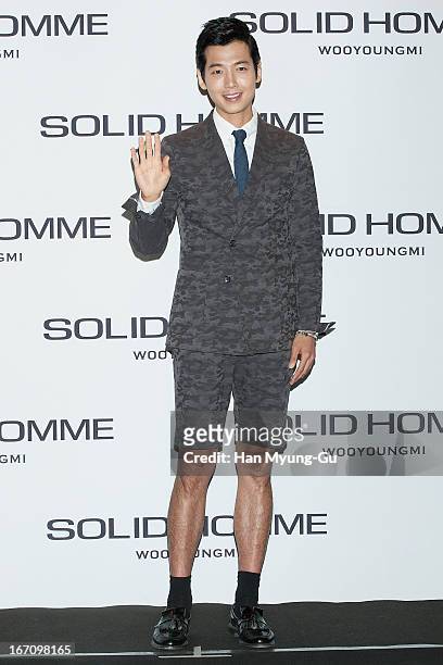 South Korean actor Jung Kyoung-Ho attends during the 'Solid Homme' Autumn/Winter 2013 Collection 25th Anniversary Fashion Show a design by Woo...