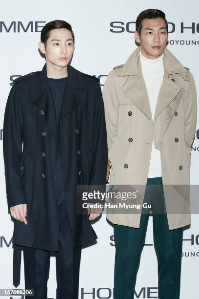 South Korean actors Lee Soo-Hyuk and Kim Young-Kwang attend during the 'Solid Homme' Autumn/Winter 2013 Collection 25th Anniversary Fashion Show a...