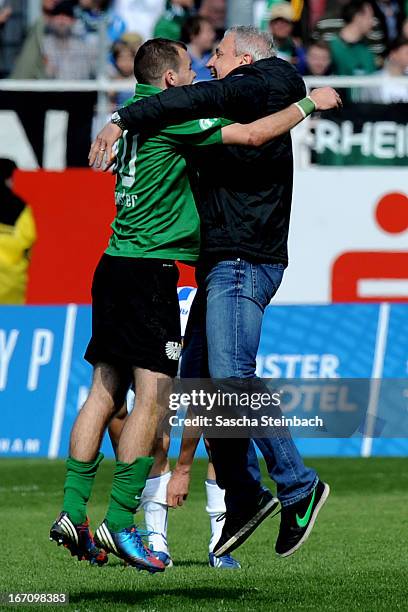 Head coach Pavel Dotchev of Muenster celebrates the victory over Karlsruhe after the 3. Liga match between Preussen Muenster and Karlsruher SC at...