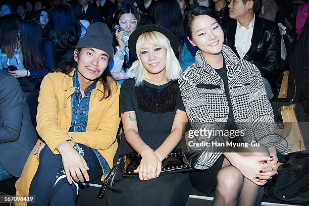 South Korean designers Steve Jung and Yoni Pai , model Kang Seung-Hyun attend during the 'Solid Homme' Autumn/Winter 2013 Collection 25th Anniversary...