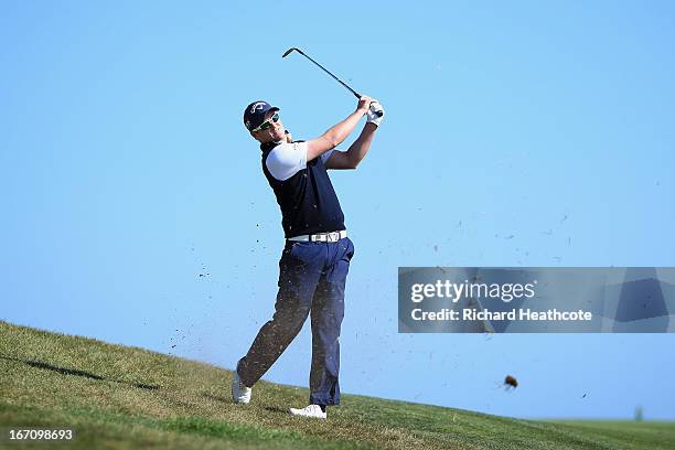 Marc Warren of Scotland plays into the 18th green during the Third round of the Open de Espana at Parador de El Saler on April 20, 2013 in Valencia,...