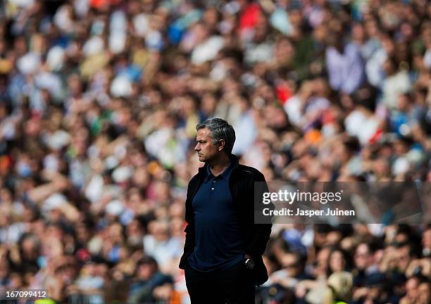 Head coach Jose Mourinho of Real Madrid follows the game during the la Liga match between Real Madrid CF and Real Betis Balompie at Estadio Santiago...