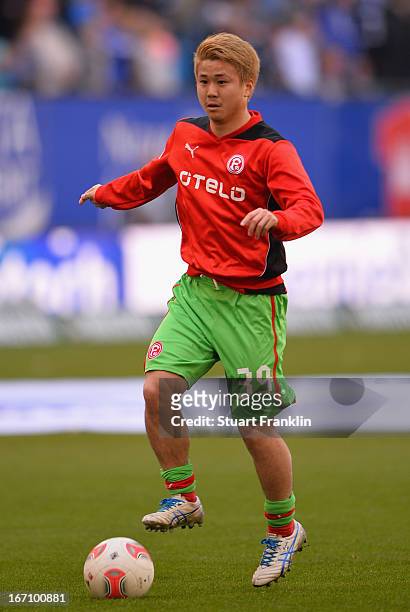 Genki Omae of Duesseldorf warms up during the Bundesliga match between Hamburger SV and Fortuna Duesseldorf 1895 at Imtech Arena on April 20, 2013 in...