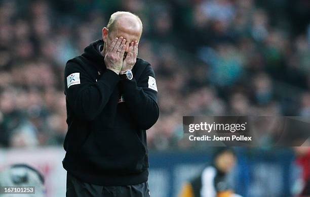 Head coach Thomas Schaaf of Bremen gestures during the Bundesliga match between SV Werder Bremen and VfL Wolfsburg at Weser Stadium on April 20, 2013...