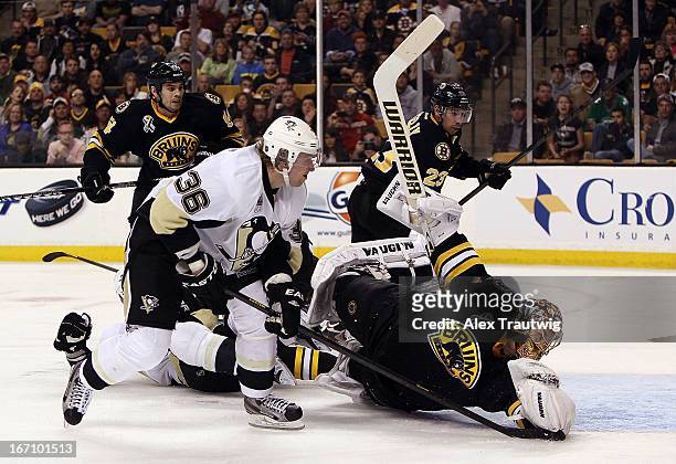 Jussi Jokinen of the Pittsburgh Penguins scores a goal against Tuukka Rask of the Boston Bruins in the second period at the TD Garden on April 20,...