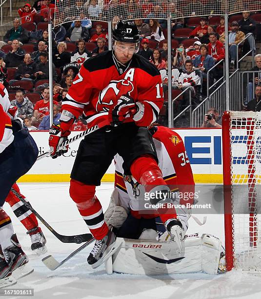 Ilya Kovalchuk of the New Jersey Devils returns from injury and screens Jacob Markstrom of the Florida Panthers during the second period at the...