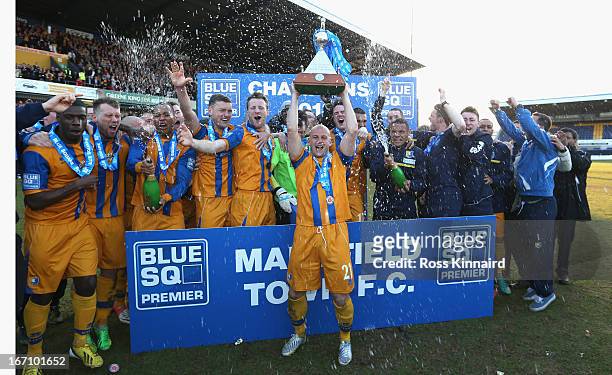 Adam Murray of Mansfield lifts the trophy as Mansfield celebrate after the Blue Square Bet Premier match between Mansfield Town and Wrexham at the...