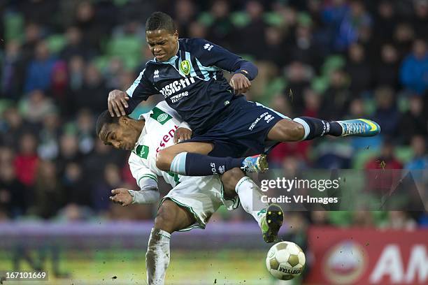 Lorenzo Burnet of FC Groningen, Charlton Vicento of ADO Den Haag during the Eredivisie match between FC Groningen and ADO Den Haag on April 20, 2013...