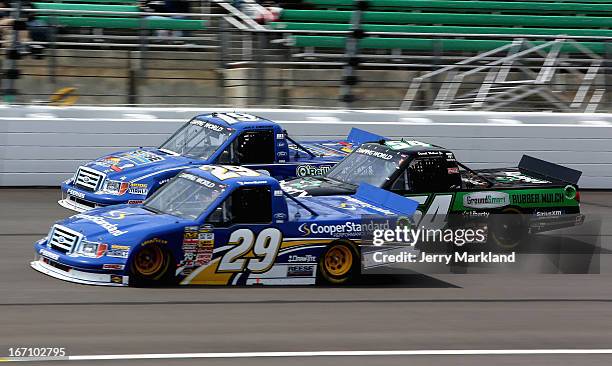 Joey Logano, driver of the Carbon Forged Reese Towpower Ford, Ryan Blaney, driver of the Cooper Standard Performance Ford, and Darrell Wallace Jr.,...