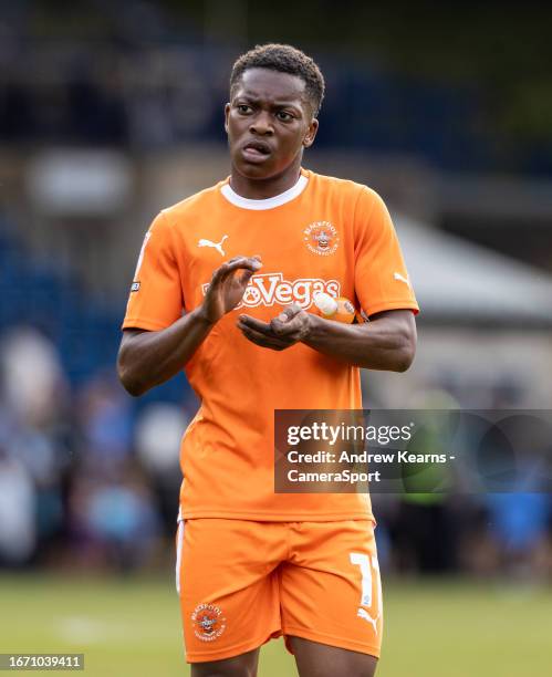 Blackpool's Karamoko Dembele applauds his side's travelling supporters at the end of the match during the Sky Bet League One match between Wycombe...