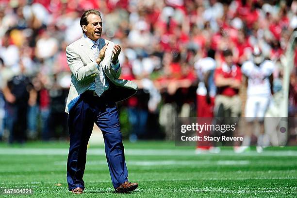 Nick Saban, head coach of the Alabama Crimson Tide applauds his team during the Alabama A-Day spring game at Bryant-Denny Stadium on April 20, 2013...