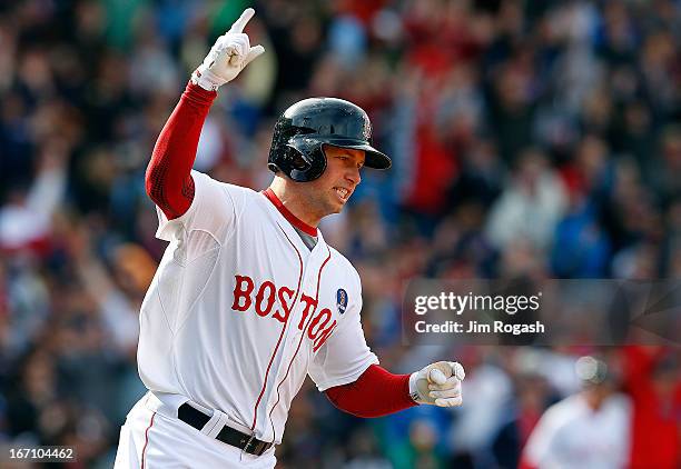 Daniel Nava of the Boston Red Sox reacts after hitting a three-run home run against the Kansas City Royals in the 8th inning at Fenway Park on April...