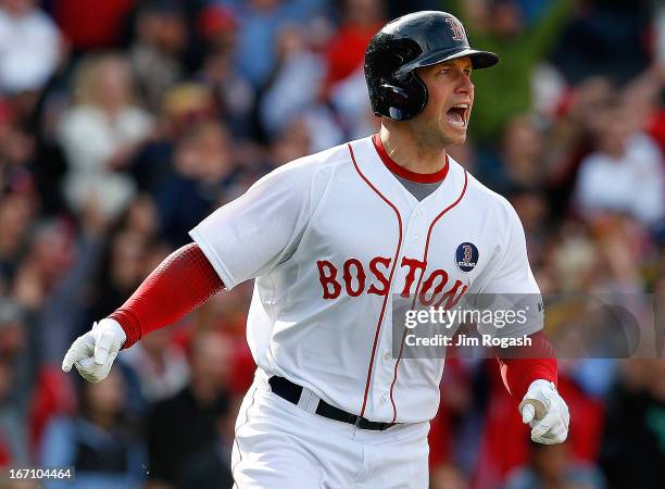 Daniel Nava of the Boston Red Sox reacts after hitting a three-run home run against the Kansas City Royals in the 8th inning at Fenway Park on April...