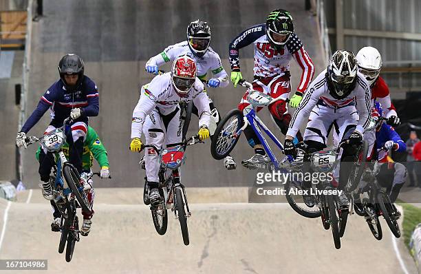 Liam Phillips of Great Britain leads the race over a jump on his way to victory in the Men's Elite Final during the UCI BMX Supercross World Cup at...