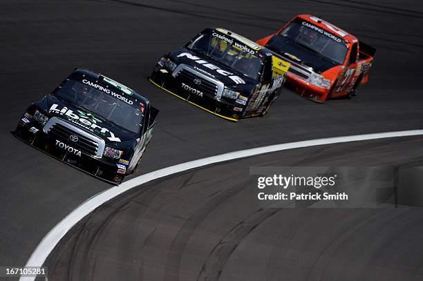 Darrell Wallace Jr., driver of the LibertyTireRecycling/Ground SmartRubber Toyota, races during the NASCAR Camping World Truck Series SFP 250 at...