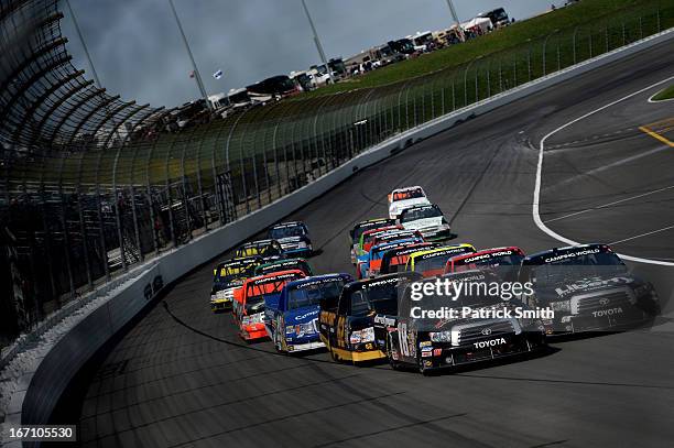 Joey Coulter, driver of the Darrell Gwynn Foundation Toyota, and Darrell Wallace Jr., driver of the LibertyTireRecycling/Ground SmartRubber Toyota,...