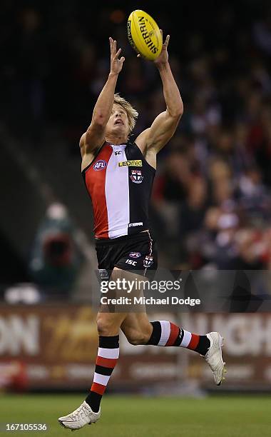 Clinton Jones of the Saints marks the ball during the round four AFL match between the St Kilda Saints and the Essendon Bombers at Etihad Stadium on...