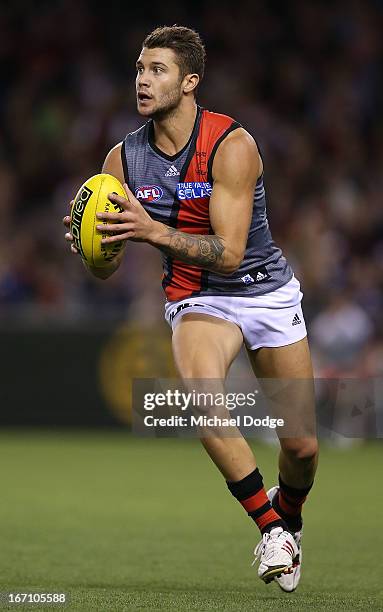 Tayte Pears of the Bombers looks ahead with the ball during the round four AFL match between the St Kilda Saints and the Essendon Bombers at Etihad...