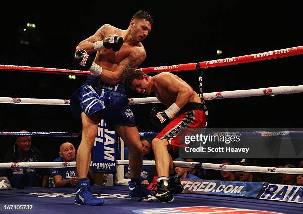 Robin Krasniqi evades a punch from Nathan Cleverly during their WBO World Light-Heavyweight Championship bout at Wembley Arena on April 20, 2013 in...