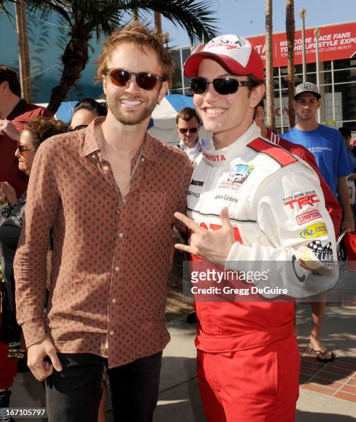 Singer Paul McDonald and actor Jackson Rathbone attend the 37th Annual Toyota Pro/Celebrity Race on April 20, 2013 in Long Beach, California.