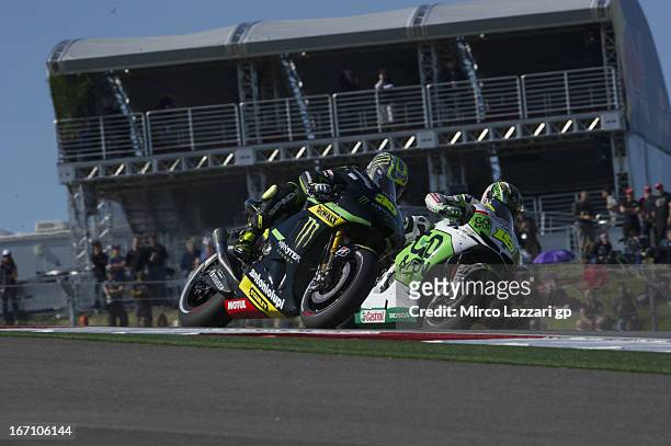 Alvaro Bautista of Spain and Go&Fun Honda Gresini and Cal Crutchlow of Great Britain and Monster Yamaha Tech 3 heads down a straight during the...