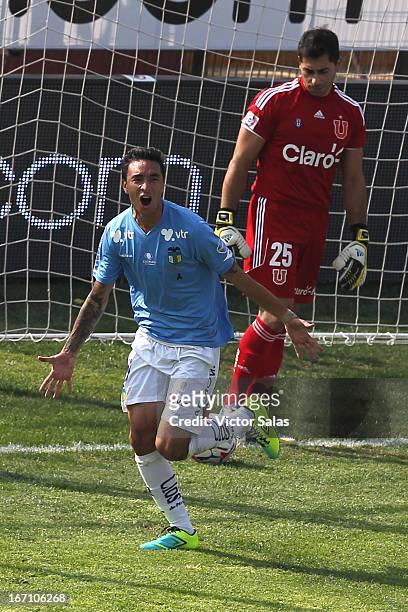 Caros Escobar, of O'Higgins, celebrates a scored goal during a match between Universidad de Chile and O'Higgins as part of the Torneo Transicion 2013...