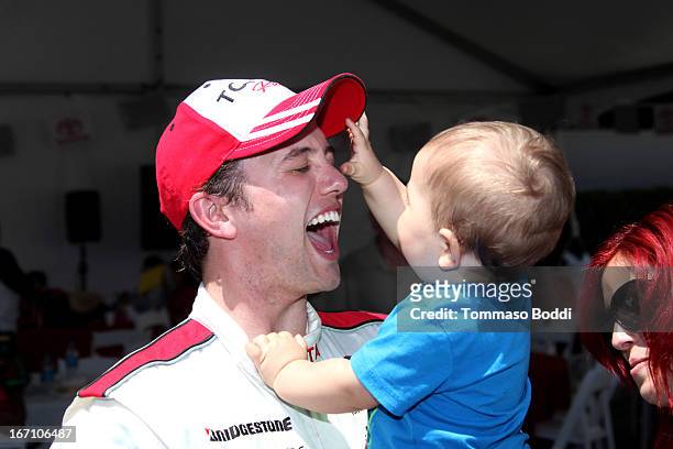 Actor Jackson Rathbone and son Monroe Jackson Rathbone VI attend the 37th Annual Toyota ProCelebrity Race on April 20, 2013 in Long Beach, California.