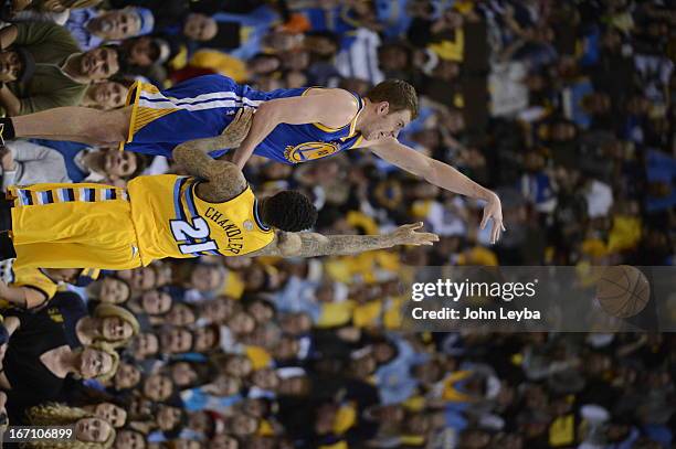 Golden State Warriors power forward David Lee takes a shot over Denver Nuggets shooting guard Wilson Chandler in the second quarter. The Denver...