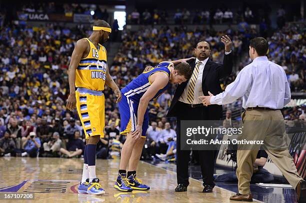 Golden State Warriors power forward David Lee leaves the court after getting hurt. The Denver Nuggets took on the Golden State Warriors in Game 1 of...