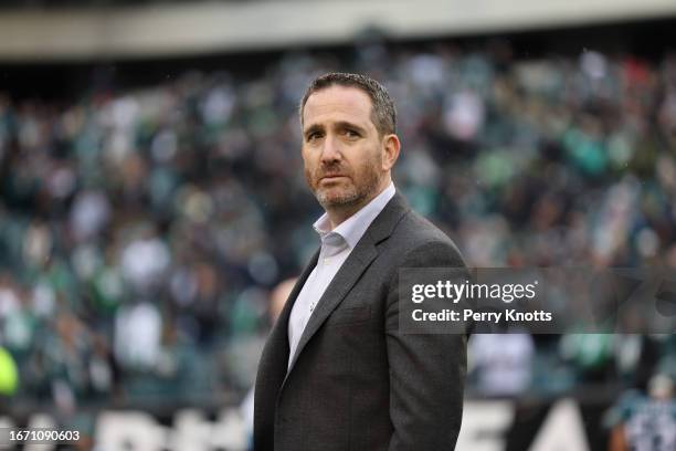 Howie Roseman of the Philadelphia Eagles stands on the field prior to an NFC Championship game against the San Francisco 49ers at Lincoln Financial...