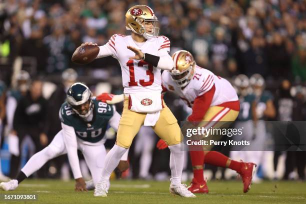 Brock Purdy of the San Francisco 49ers throws a pass during an NFC Championship game against the Philadelphia Eagles at Lincoln Financial Field on...