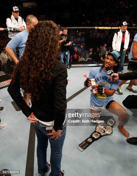 Benson Henderson proposes to his girlfriend Maria Magana during the UFC on FOX event during the UFC on FOX event at the HP Pavilion on April 20, 2013...