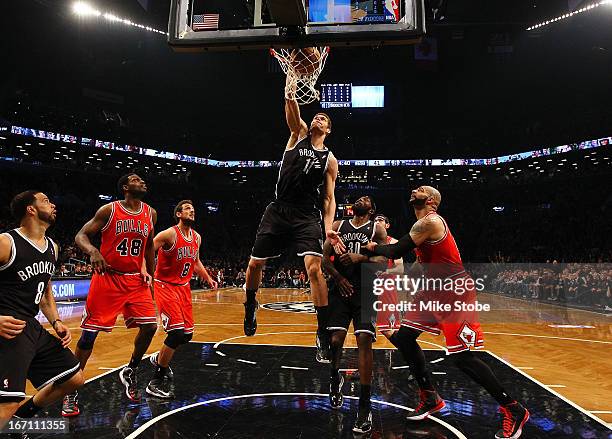 Brook Lopez of the Brooklyn Nets dunks the ball against the Chicago Bulls during Game One of the Eastern Conference Quarterfinals of the 2013 NBA...